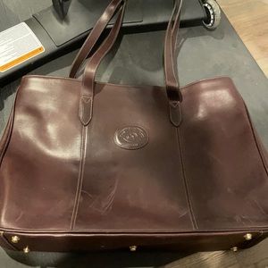 Ghurka leather tote.